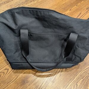 Lo & Sons Black Canvas Tote Bag Fits Atop Luggage